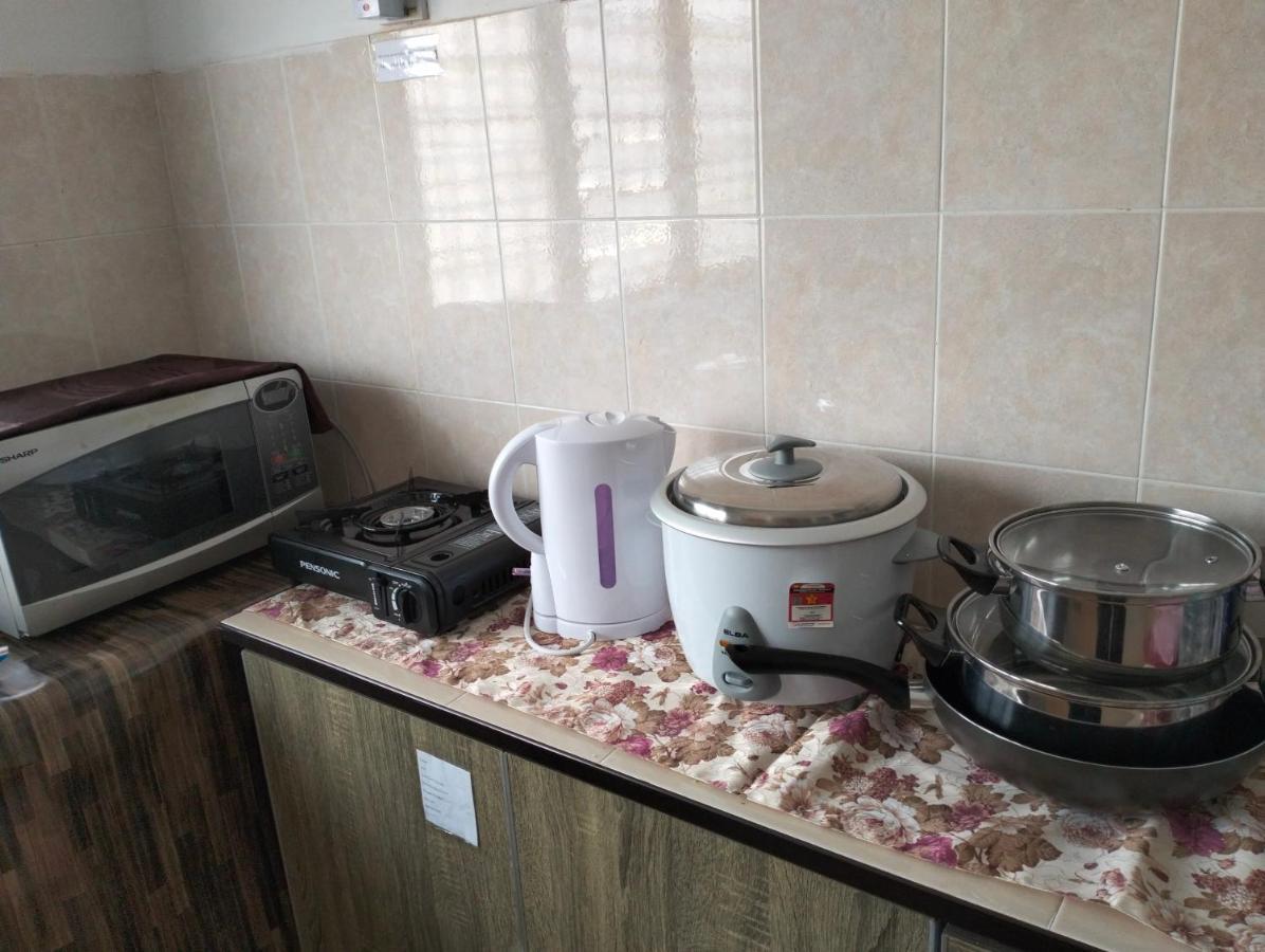Anggun Homestay Сери-Искандар Экстерьер фото